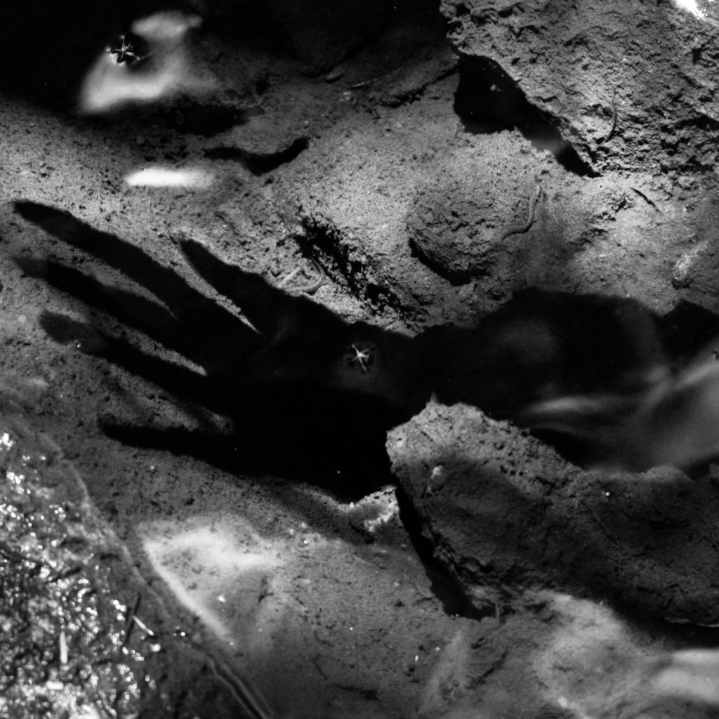 Video still captured of shadow hand appearing to be underwater